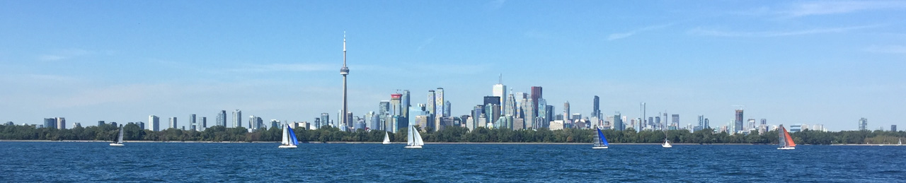 Panoramic view of the Toronto harbourfront and downtown where the Toronto Law firm of Fernandes Hearn is located.