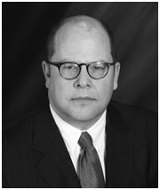 Profile headshot image of Toronto lawyer Gordon Hearn in black and white.