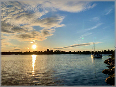 Sun setting over the bay for the 2021 June newsletter.
