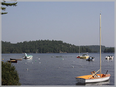 Sailboats at anchor to symbolize our the 2022 April newsletter.